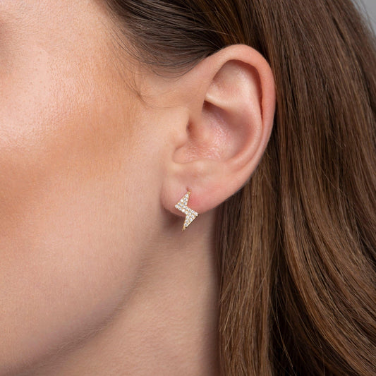 Close detail of the Dainty Lightning Bolt Stud Earrings in 18K Gold Vermeil. Tarnish-resistant, premium handmade jewelry.