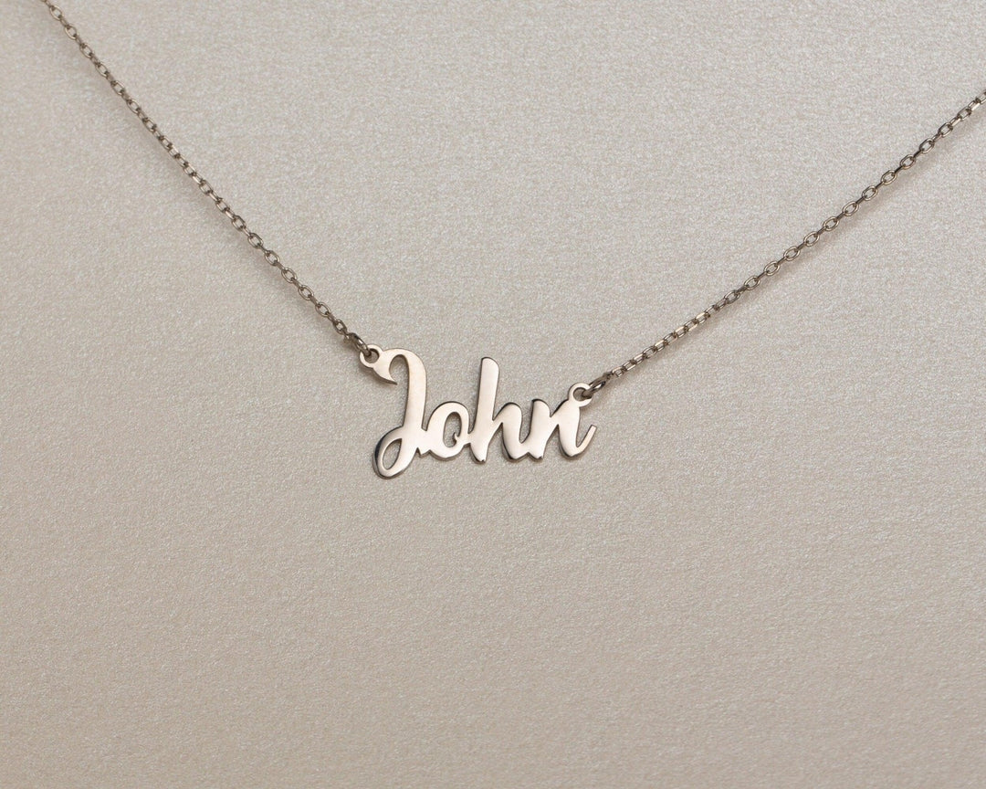 Macro detail of the Dainty Name Necklace showcasing craftsmanship in 18K Gold Vermeil. Tarnish-resistant, handmade.