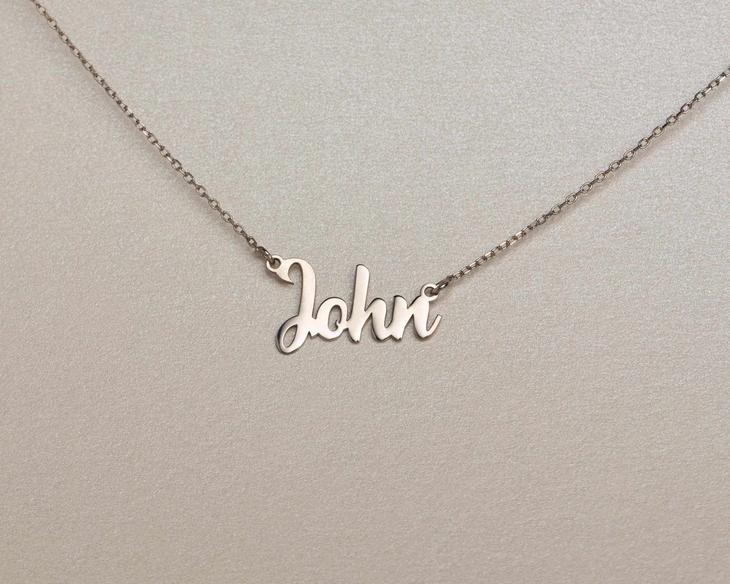 Macro detail of the Dainty Name Necklace showcasing craftsmanship in 18K Gold Vermeil. Tarnish-resistant, handmade.