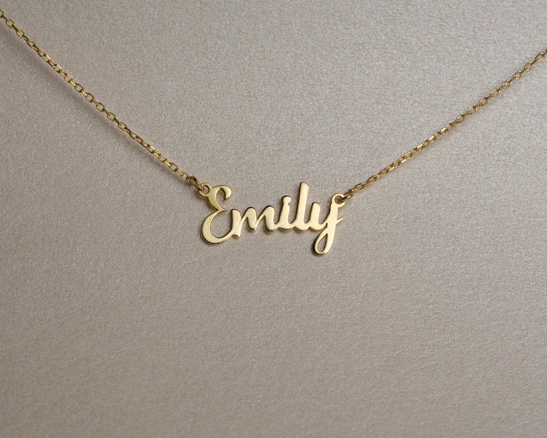 The Dainty Name Necklace styled in 18K Gold Vermeil — elegant everyday jewelry. Hypoallergenic, no green marks.