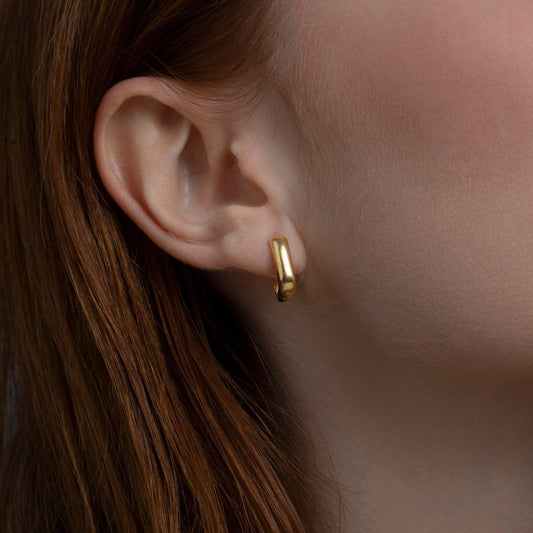 Close detail of the Dainty Square Huggie Hoop Earrings in 18K Gold Vermeil. Tarnish-resistant, premium handmade jewelry.