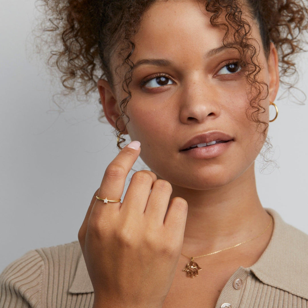 The Dainty Star Pavé Ring styled in 18K Gold Vermeil — elegant everyday jewelry. Tarnish-resistant.