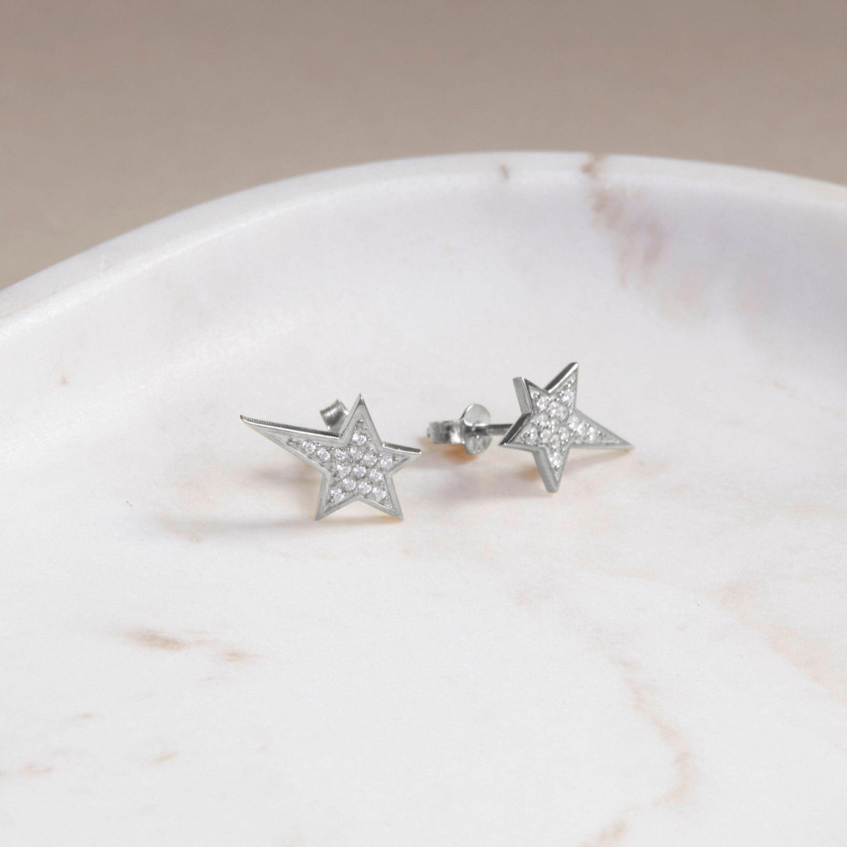 Dainty Star Stud Earrings as a thoughtful birthday gift in 18K Gold Vermeil. Hypoallergenic for sensitive ears.