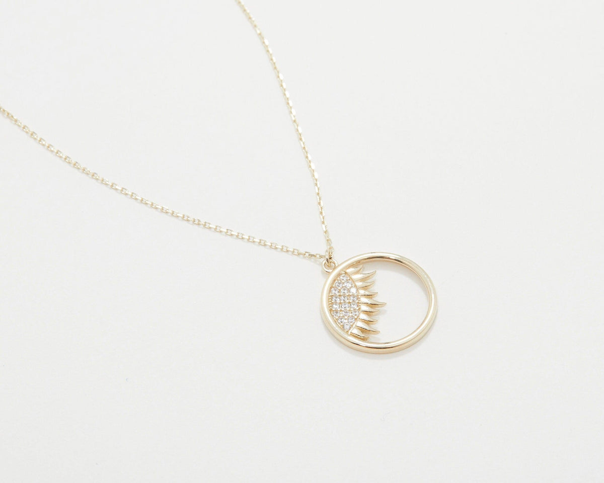 The Dainty Evil Eye Sun Necklace as a graduation gift in 18K Gold Vermeil. Safe for sensitive skin, made for keeping.