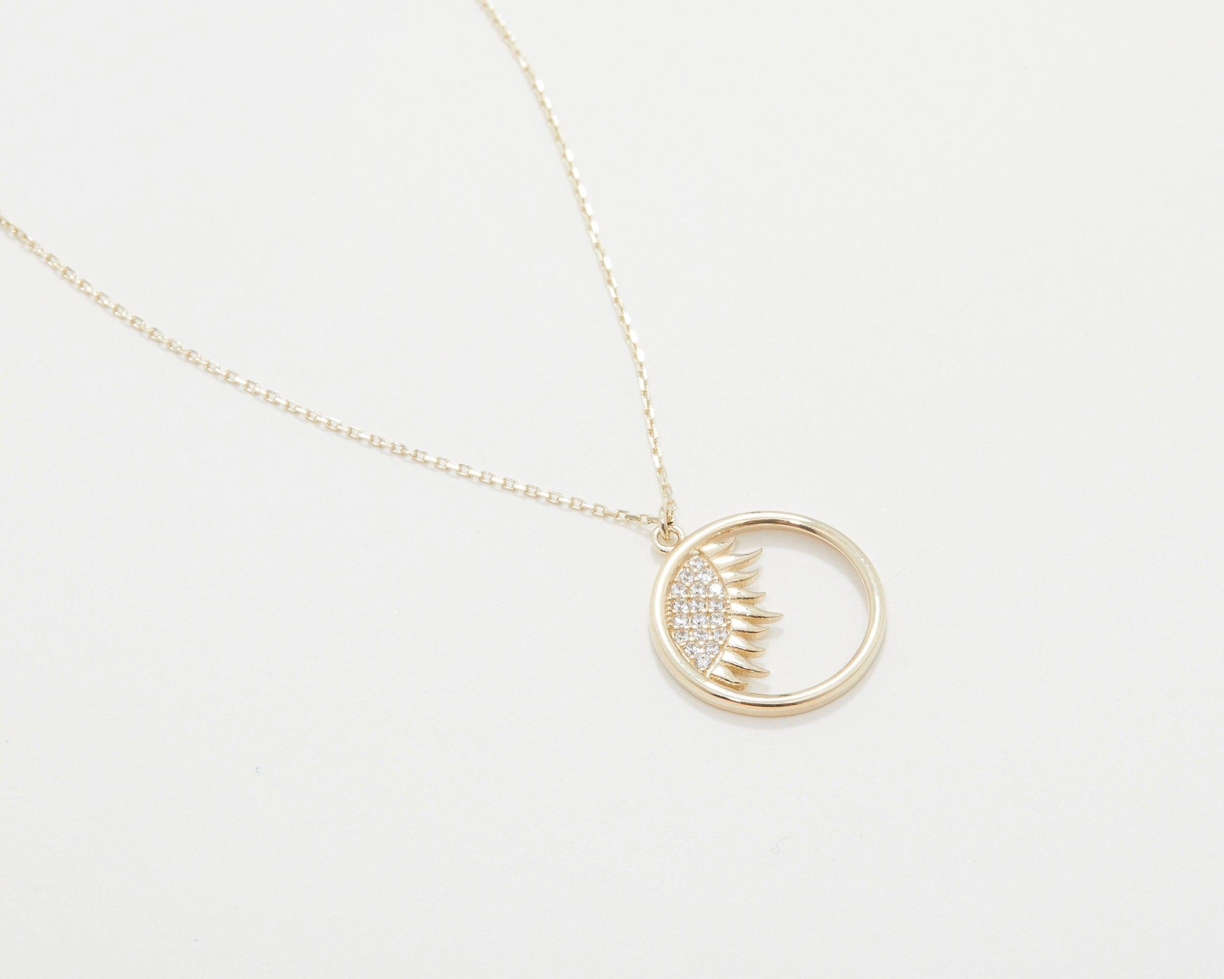 The Dainty Evil Eye Sun Necklace as a graduation gift in 18K Gold Vermeil. Safe for sensitive skin, made for keeping.