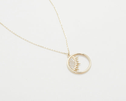 The Dainty Evil Eye Sun Necklace as a graduation gift in 18K Gold Vermeil. Safe for sensitive skin, made for keeping.