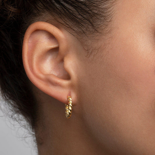 Close detail of the Dainty Twisted Hoop Earrings in 18K Gold Vermeil. Tarnish-resistant, premium handmade jewelry.