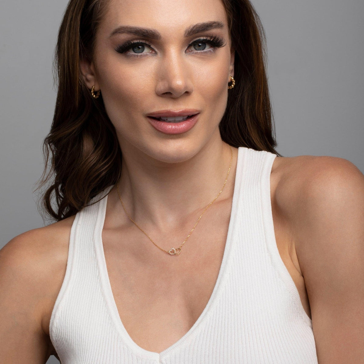 The Double Heart Necklace as a wedding gift in 18K Gold Vermeil. Safe for sensitive skin, made for keeping.
