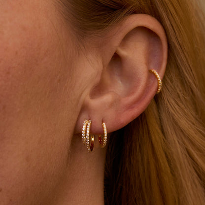 Macro detail of the Double Hoop Pavé Earring Set: CZ Diamond set in 18K Gold Vermeil. No green marks, handmade jewelry.
