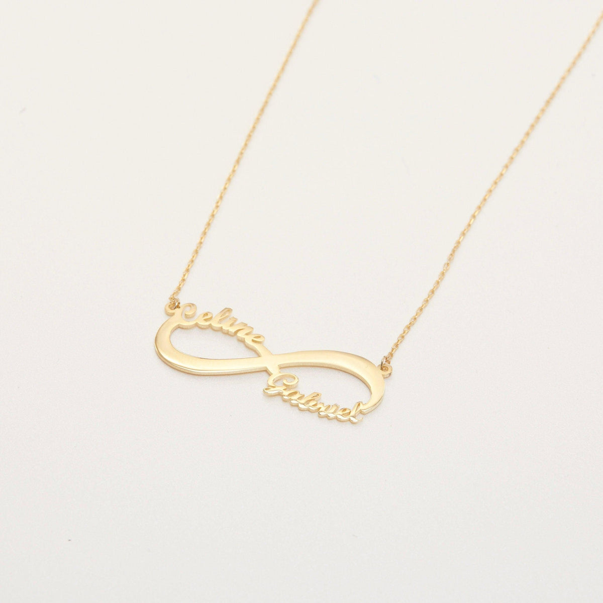 The Double Infinity Name Necklace as a mother's day gift in 18K Gold Vermeil. Safe for sensitive skin, made for keeping.
