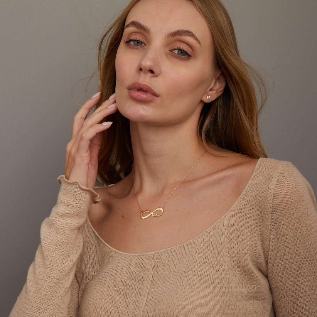The Double Infinity Name Necklace styled in 18K Gold Vermeil — elegant everyday jewelry. Hypoallergenic, no green marks.