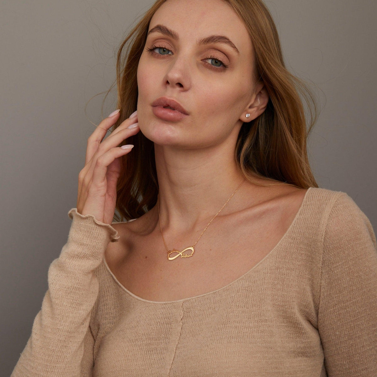 The Double Infinity Name Necklace styled in 18K Gold Vermeil — elegant everyday jewelry. Hypoallergenic, no green marks.