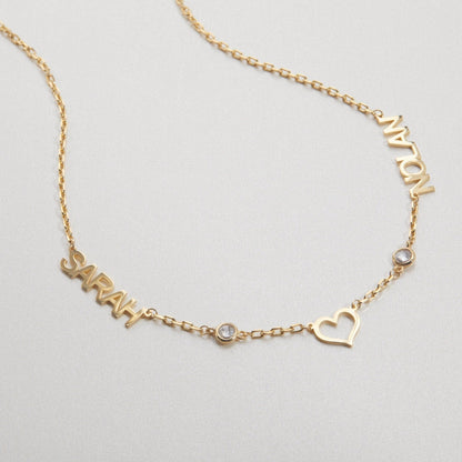 Macro detail of the Double Name Necklace with Birthstone: Birthstone set in 18K Gold Vermeil. Tarnish-resistant, handmade.