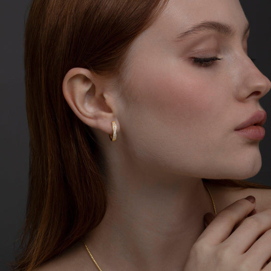 Close detail of the Double Row Huggie Hoop Earring in 18K Gold Vermeil. Tarnish-resistant, premium handmade jewelry.