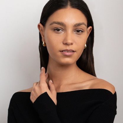 The Chunky Earrings for Women styled in Gold-Plated Steel — elegant everyday jewelry. Hypoallergenic for sensitive ears.
