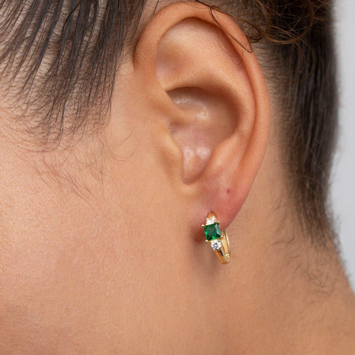The Emerald Hoop Dangle Earrings styled in 18K Gold Vermeil — elegant everyday jewelry. Hypoallergenic for sensitive ears.