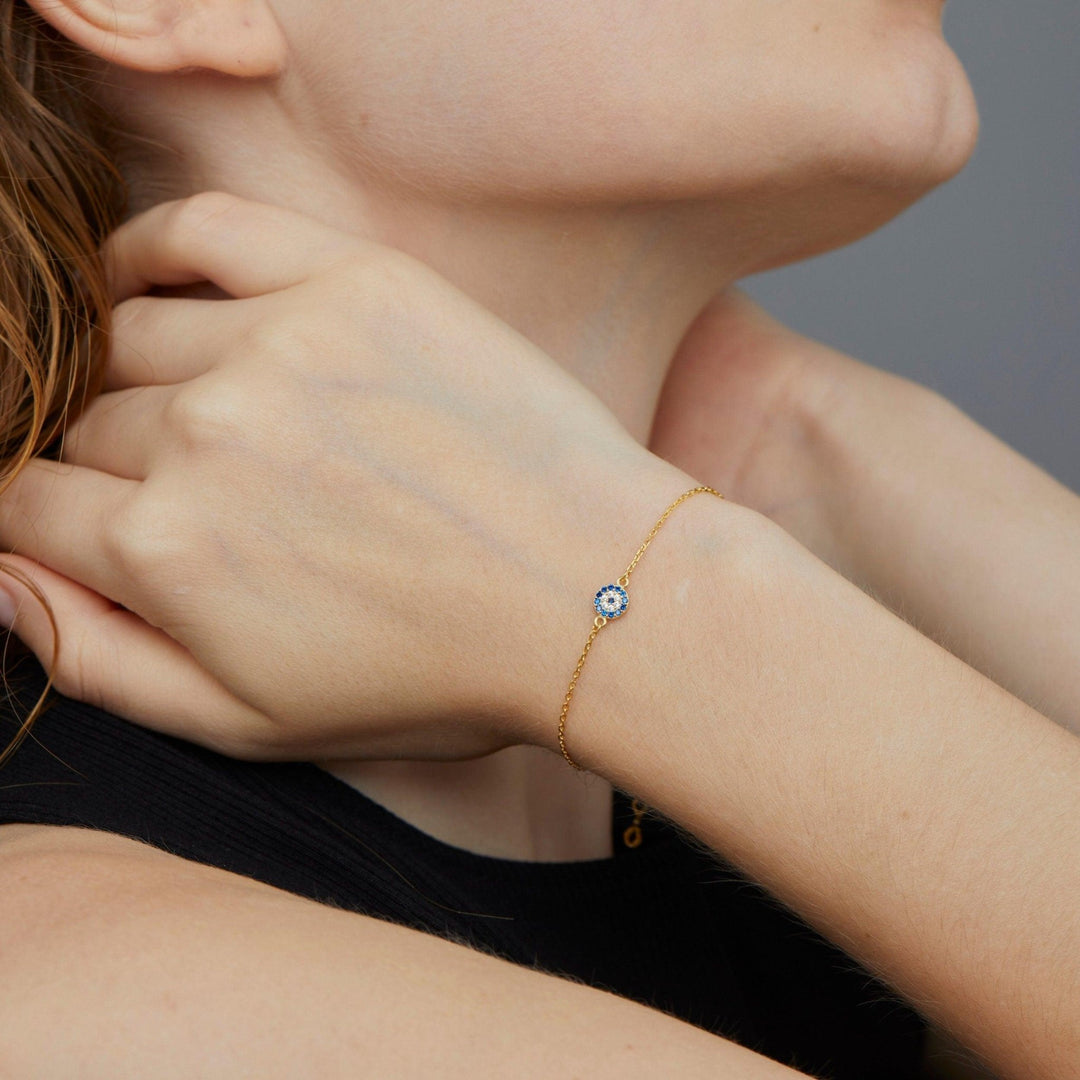 The Evil Eye Bracelet as a graduation gift in 18K Gold Vermeil. Safe for sensitive skin, made for keeping.