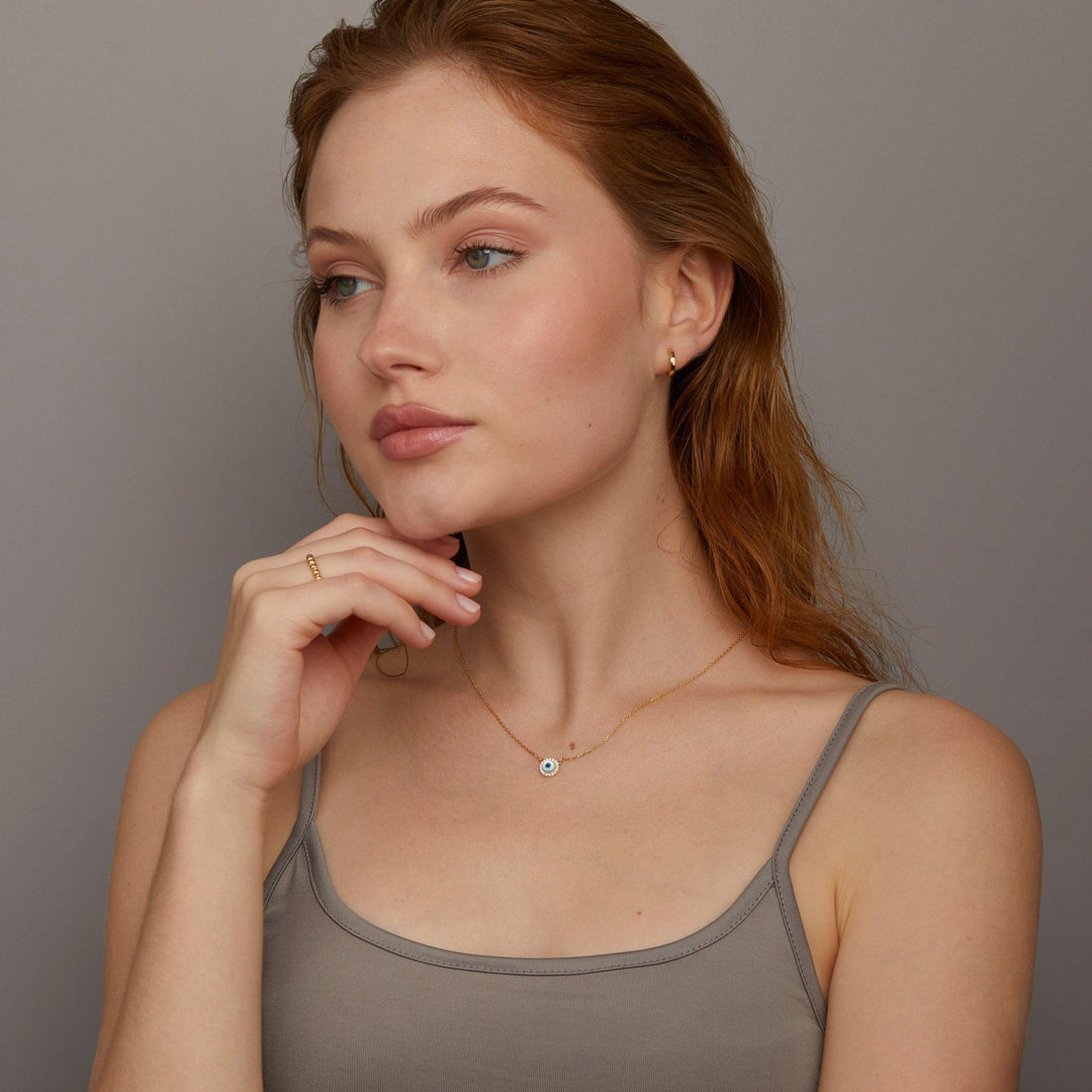 The Evil Eye Necklace styled in 18K Gold Vermeil — elegant everyday jewelry. Hypoallergenic, no green marks.