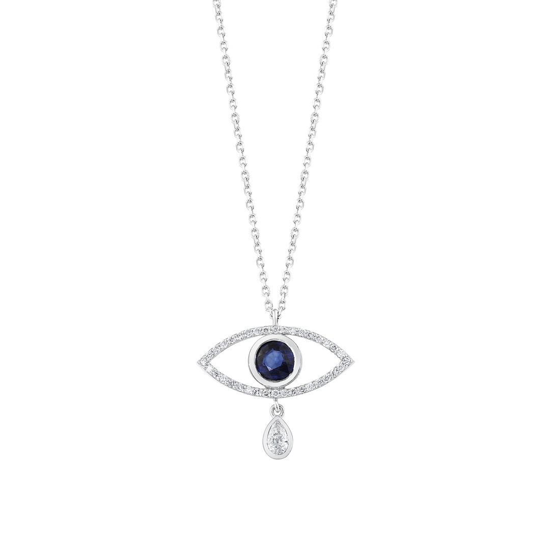 Close-up of the evil eye pendant: bezel-set blue sapphire, a single row of natural round diamonds and a swinging pear diamond drop in 14K white gold