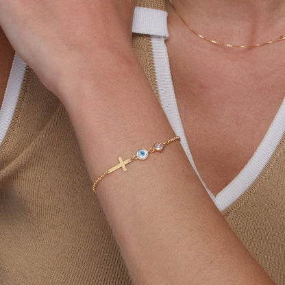 Close detail of the Evil Eye with Cross Bracelet in 18K Gold Vermeil. Safe for sensitive skin, premium handmade jewelry.