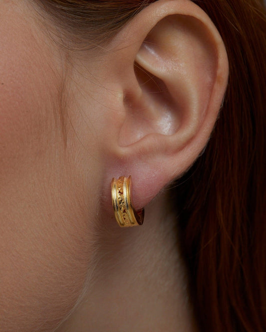 Close detail of the Fashion Gold Huggie Hoop Earring in 18K Gold Vermeil. Tarnish-resistant, premium handmade jewelry.
