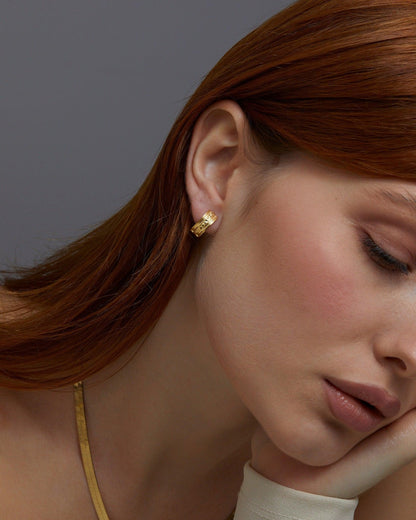 Macro detail of the Fashion Gold Huggie Hoop Earring showcasing craftsmanship in 18K Gold Vermeil. No green marks, handmade.