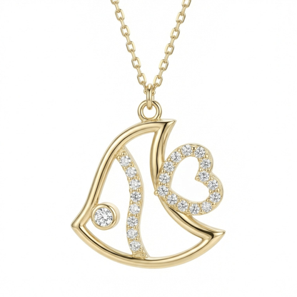 Fish pendant necklace in 14K solid gold: an open fish outline with a bezel-set CZ eye, a curved CZ stripe and an open CZ heart.