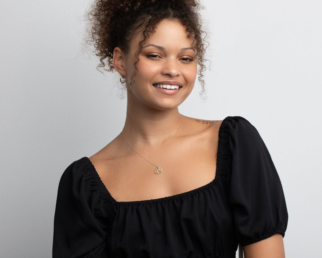 The Fish Necklace as a graduation gift in 18K Gold Vermeil. Safe for sensitive skin, made for keeping.