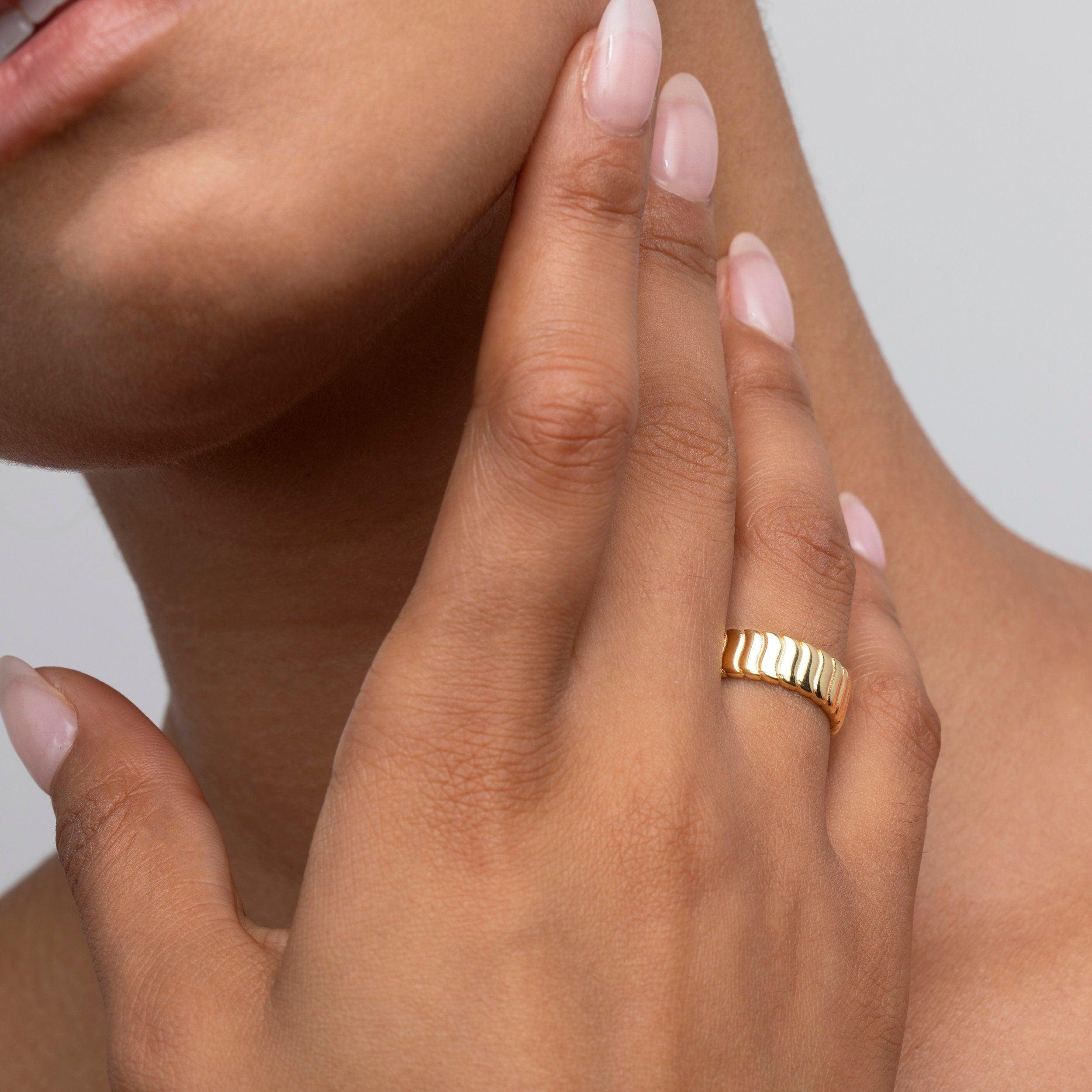 Close detail of the Flat Croissant Adjustable Stackable Ring in 18K Gold Vermeil. Hypoallergenic, no green marks, premium.