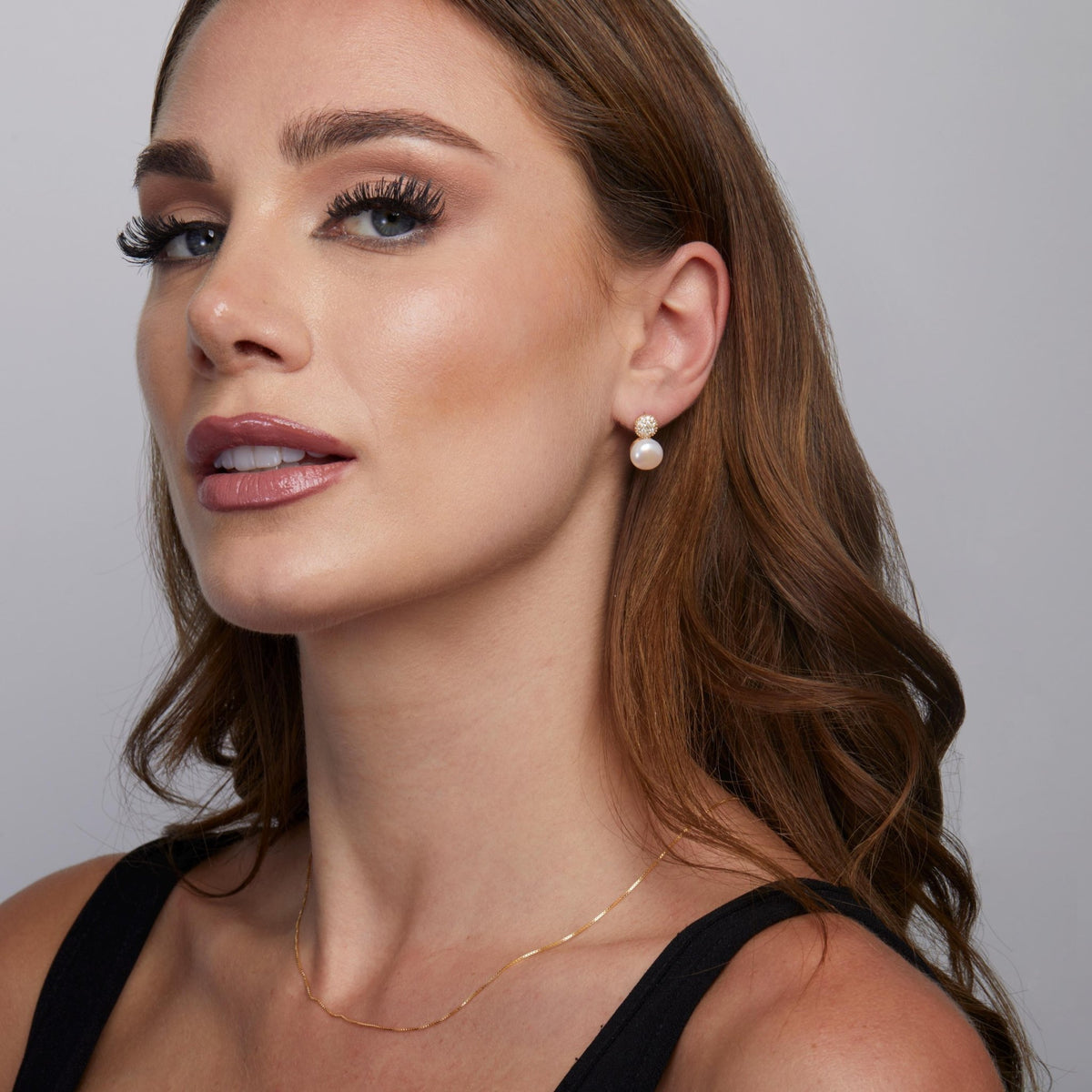 The Freshwater Pearl Pavé Circle Earrings styled in 18K Gold Vermeil — elegant everyday jewelry. Hypoallergenic.