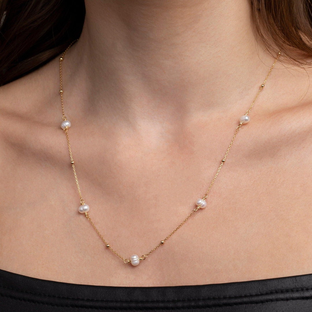 The Freshwater Pearl Satellite Necklace styled in 18K Gold Vermeil — elegant everyday jewelry. Tarnish-resistant.