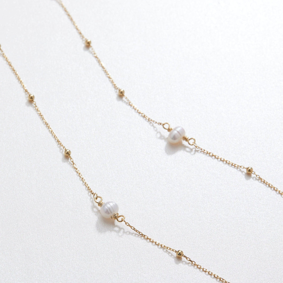 The Freshwater Pearl Satellite Necklace as a wedding gift in 18K Gold Vermeil. Tarnish-resistant, made for keeping.
