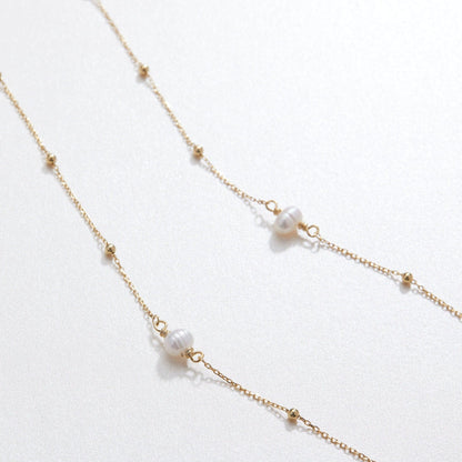 The Freshwater Pearl Satellite Necklace as a wedding gift in 18K Gold Vermeil. Tarnish-resistant, made for keeping.