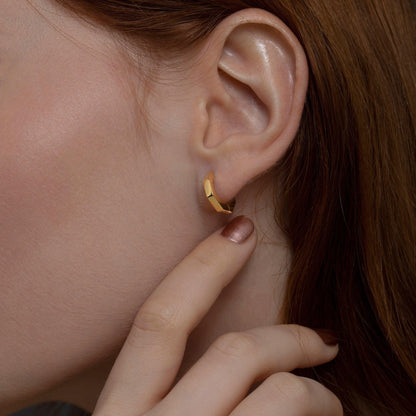The Geometric Hexagon Huggie Earrings as a daily wear gift in 18K Gold Vermeil. Tarnish-resistant, made for keeping.