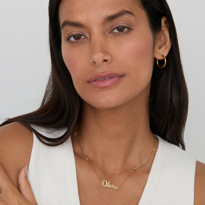 Gold Butterfly Name Necklace styled with gold hoops — everyday personalized necklace.