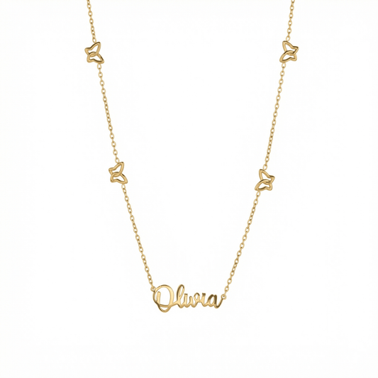 Gold Butterfly Name Necklace — gold script nameplate with four open butterfly charms on a cable chain.