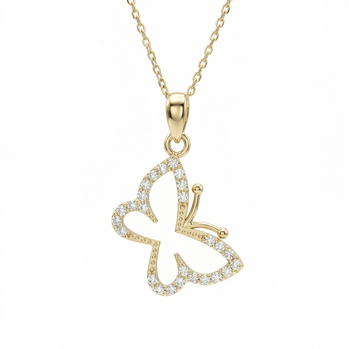 Gold Butterfly Necklace in 14K solid gold: an open butterfly pendant with small CZ stones along its wings, on a fine chain.