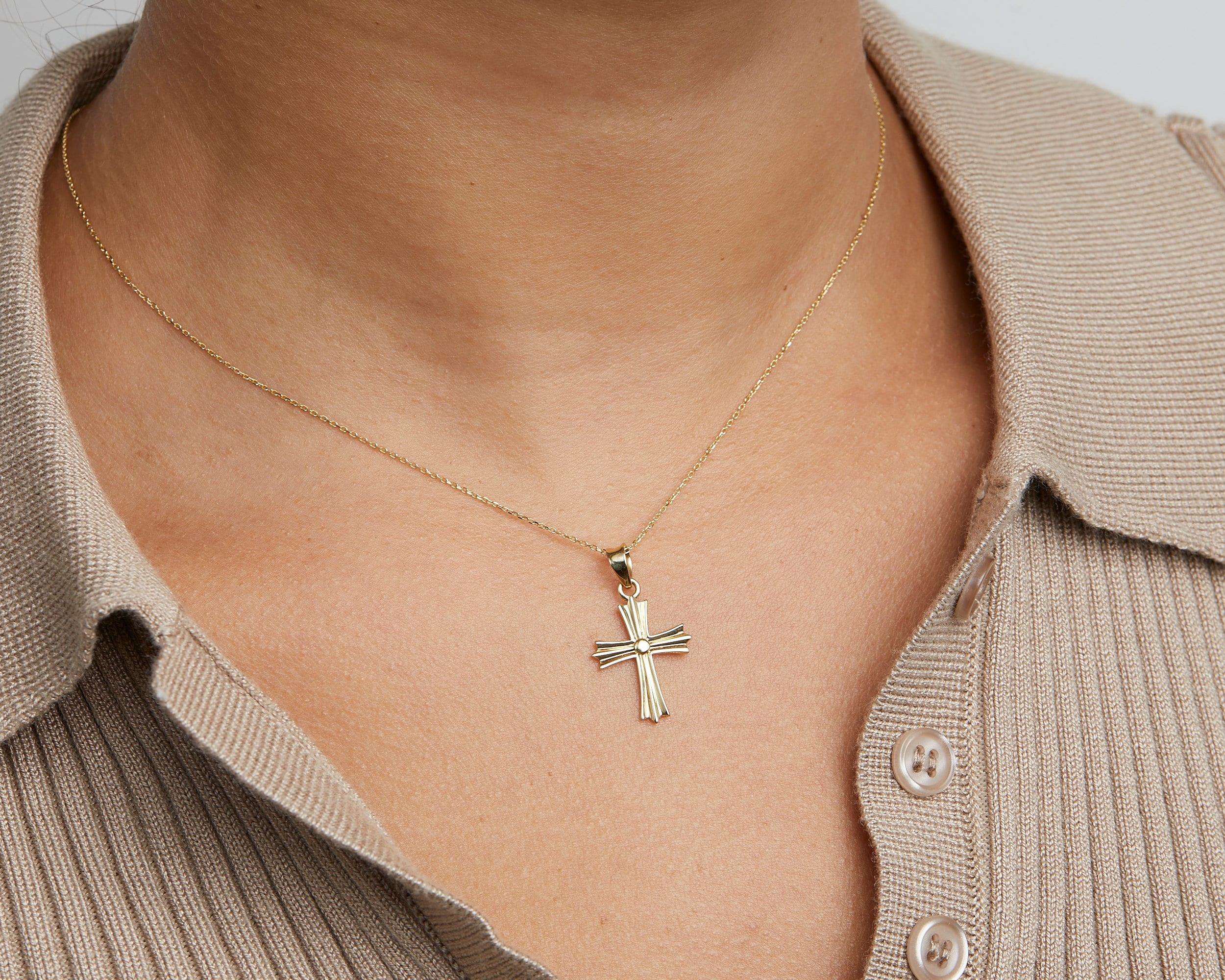 Close detail of the Gold Cross Necklace in 18K Gold Vermeil. Safe for sensitive skin, premium handmade jewelry.