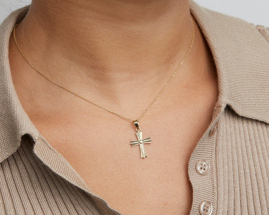 Close detail of the Gold Cross Necklace in 18K Gold Vermeil. Safe for sensitive skin, premium handmade jewelry.