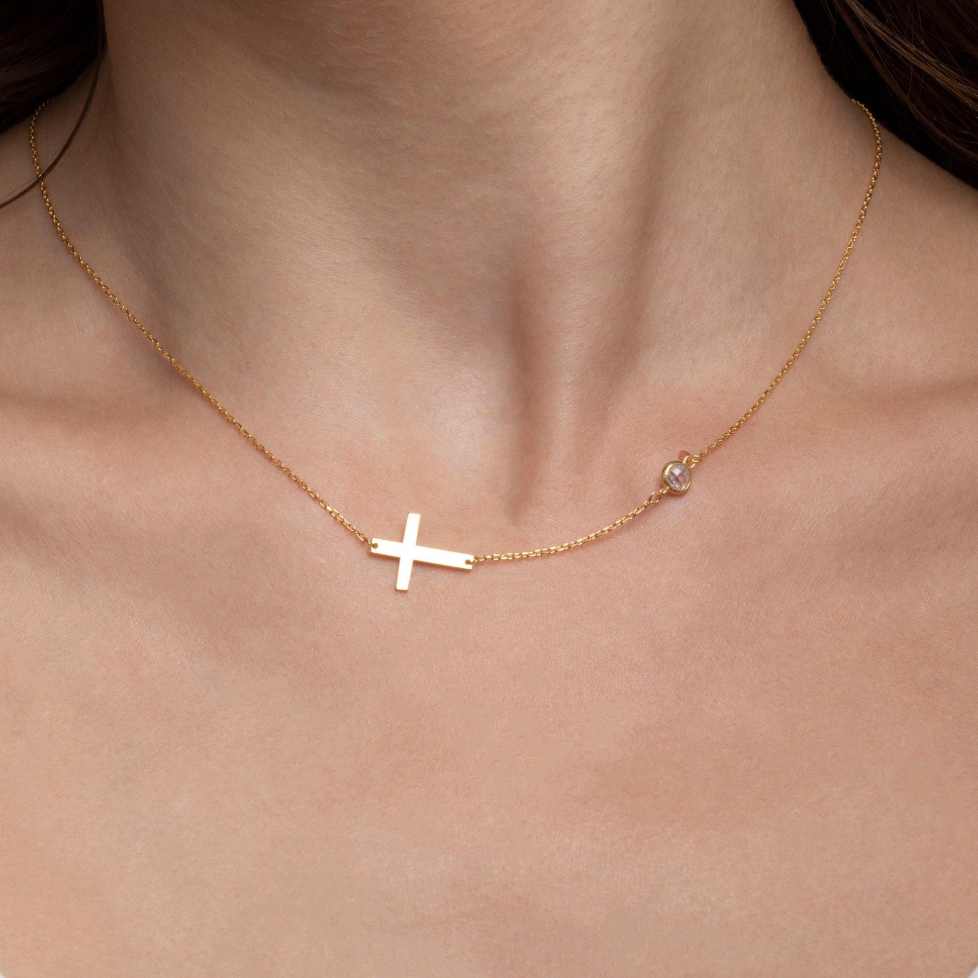 Close detail of the Gold Cross Necklace with CZ Diamond in 18K Gold Vermeil with CZ Diamond. Safe for sensitive skin.