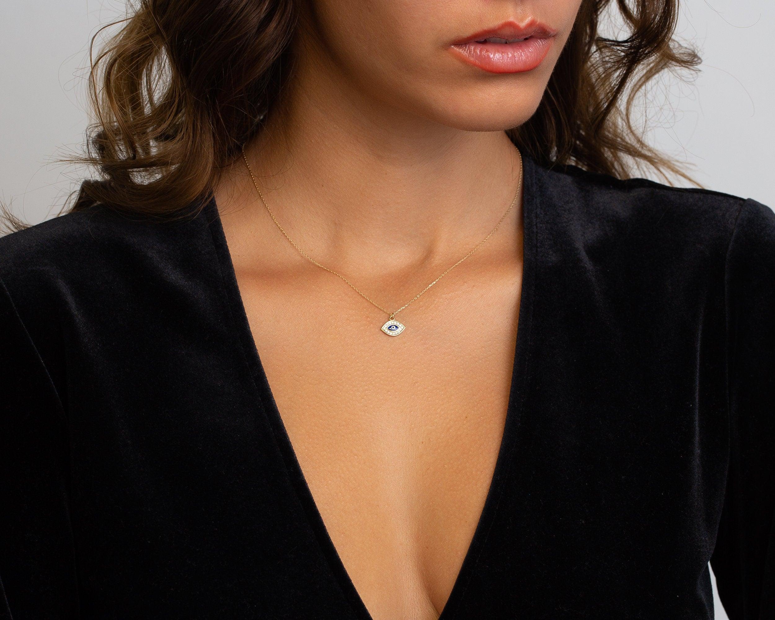 The Gold Evil Eye Necklace styled in 18K Gold Vermeil — elegant everyday jewelry. Hypoallergenic, no green marks.