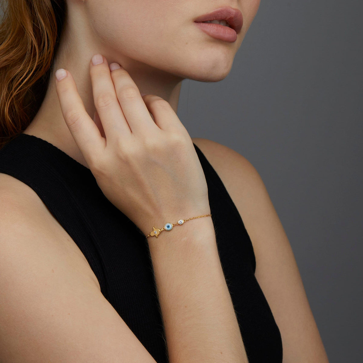 Gold Hamsa Hand Evil Eye Bracelet as a thoughtful birthday gift in 18K Gold Vermeil. Hypoallergenic, no green marks.