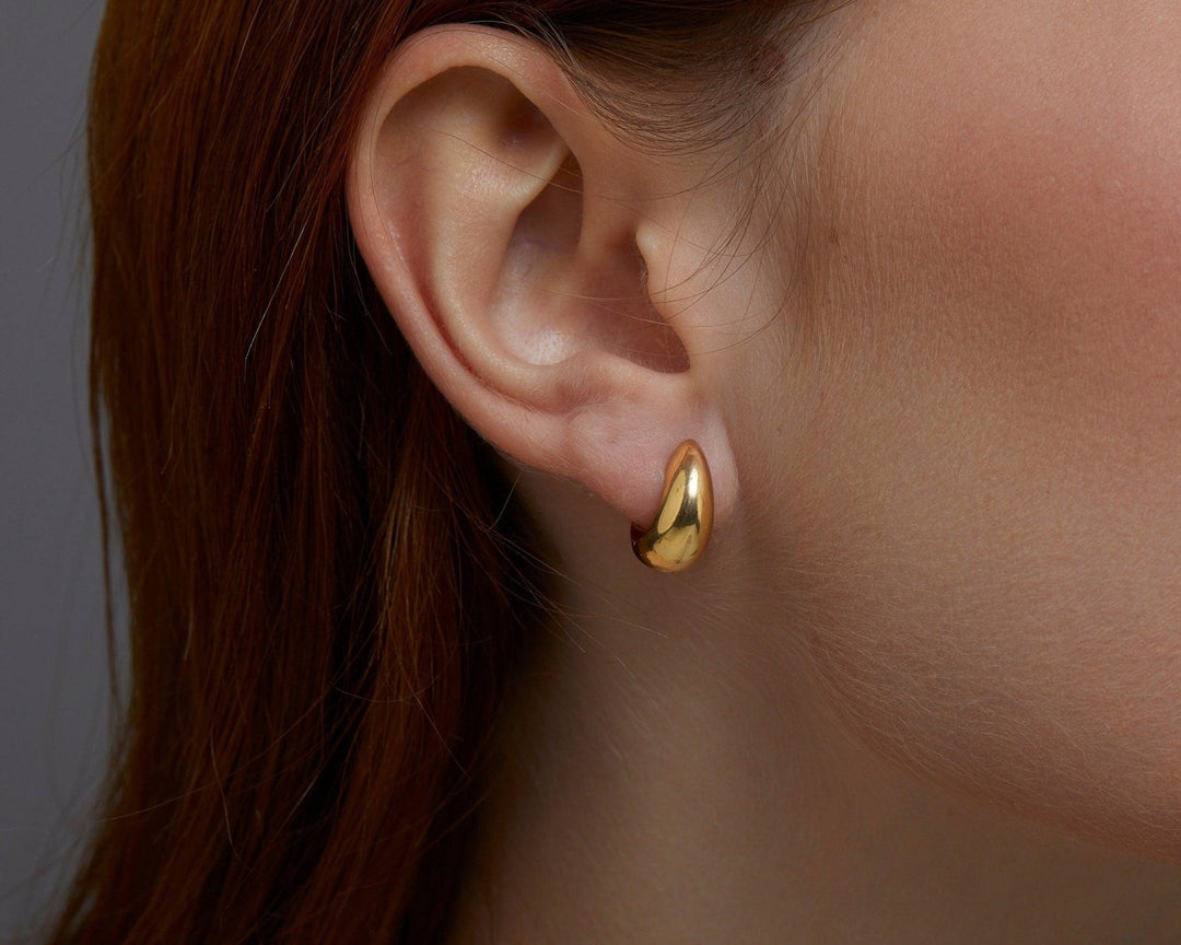 Close detail of the Gold Hinged Huggie Earrings in 18K Gold Vermeil. Tarnish-resistant, premium handmade jewelry.