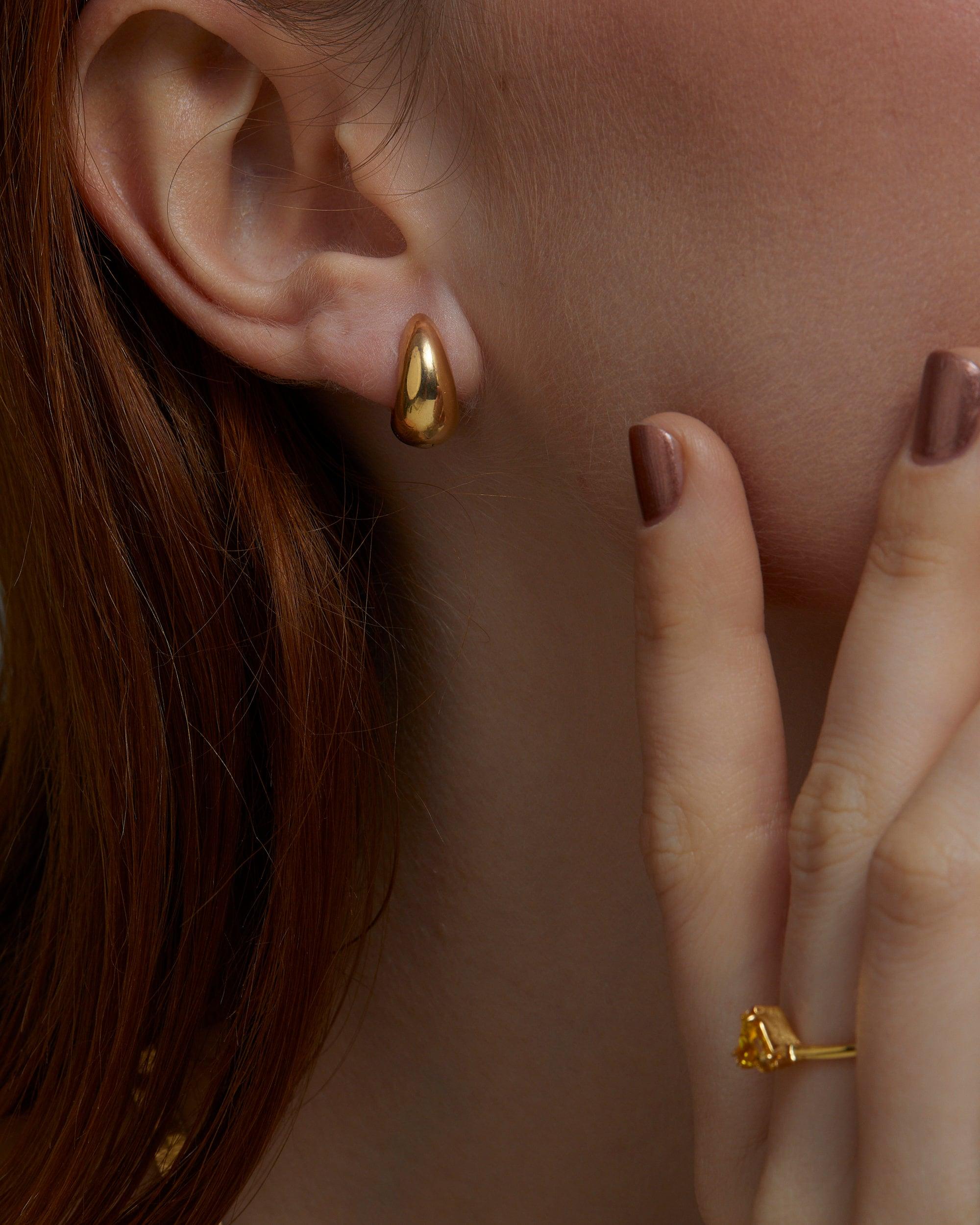Gold Hinged Huggie Earrings as a thoughtful birthday gift in 18K Gold Vermeil. Hypoallergenic for sensitive ears.