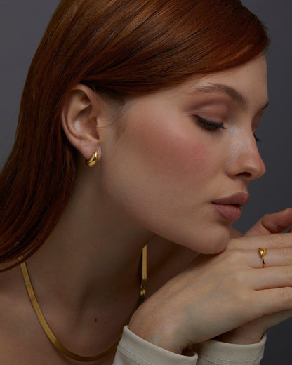 Macro detail of the Gold Hinged Huggie Earrings showcasing craftsmanship in 18K Gold Vermeil. No green marks, handmade.