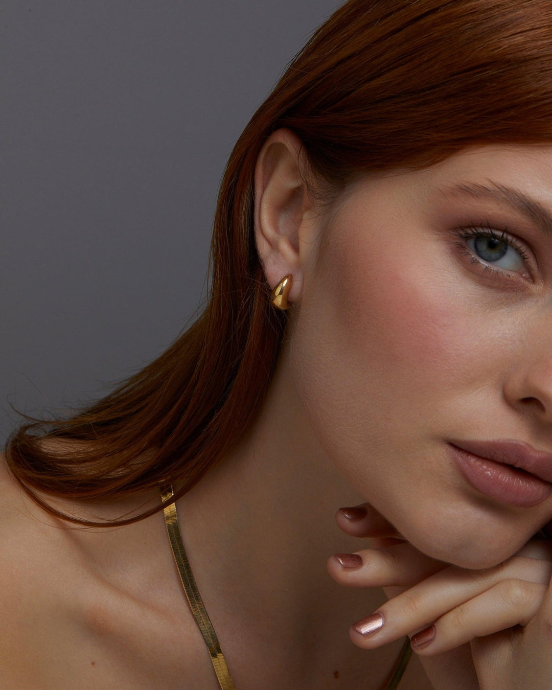 The Gold Hinged Huggie Earrings as an anniversary gift in 18K Gold Vermeil. Tarnish-resistant, made for keeping.