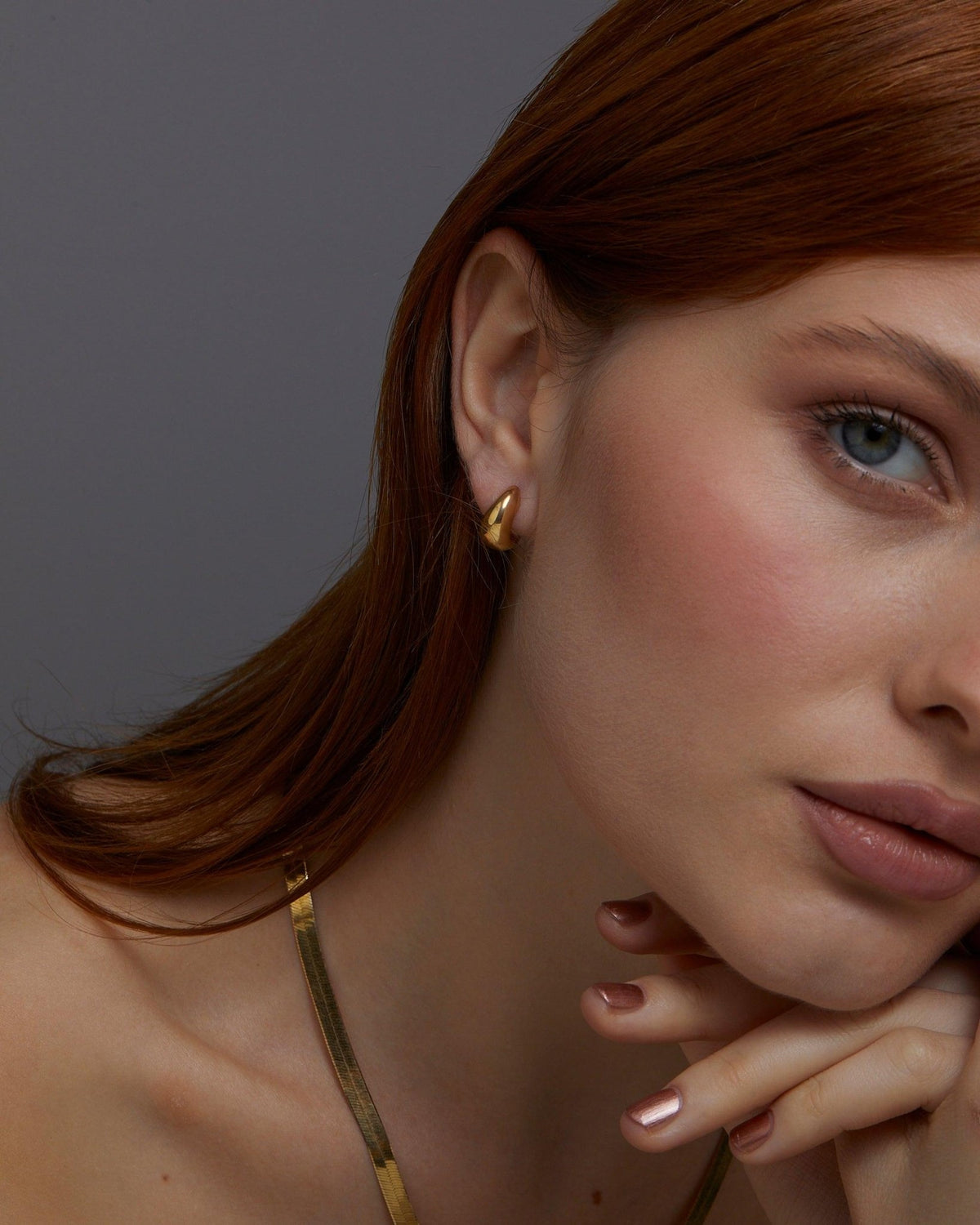 The Gold Hinged Huggie Earrings as an anniversary gift in 18K Gold Vermeil. Tarnish-resistant, made for keeping.