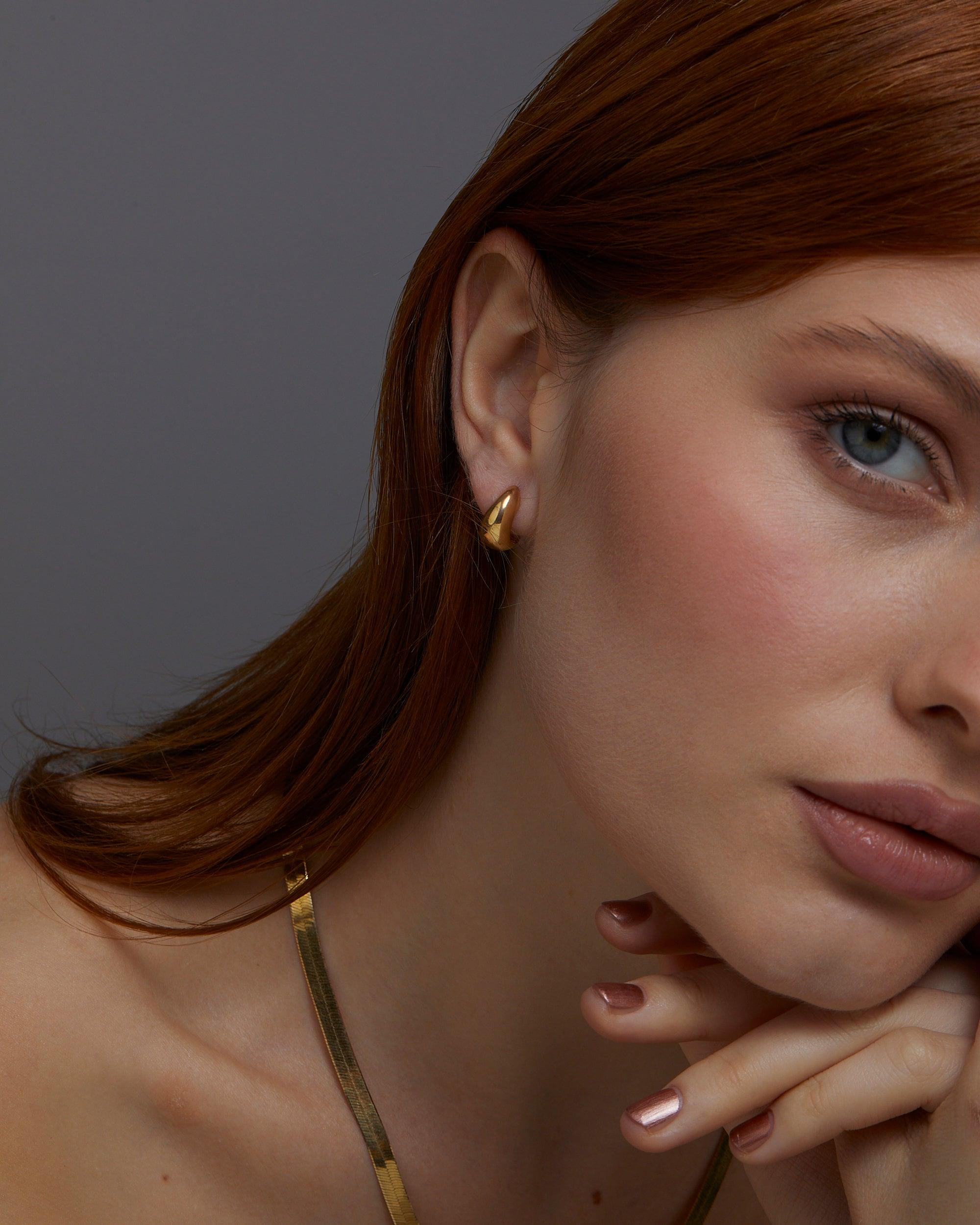 The Gold Hinged Huggie Earrings as an anniversary gift in 18K Gold Vermeil. Tarnish-resistant, made for keeping.