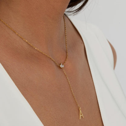 Gold Initial Lariat Necklace as a thoughtful birthday gift in Gold-Plated Steel. Hypoallergenic, no green marks.
