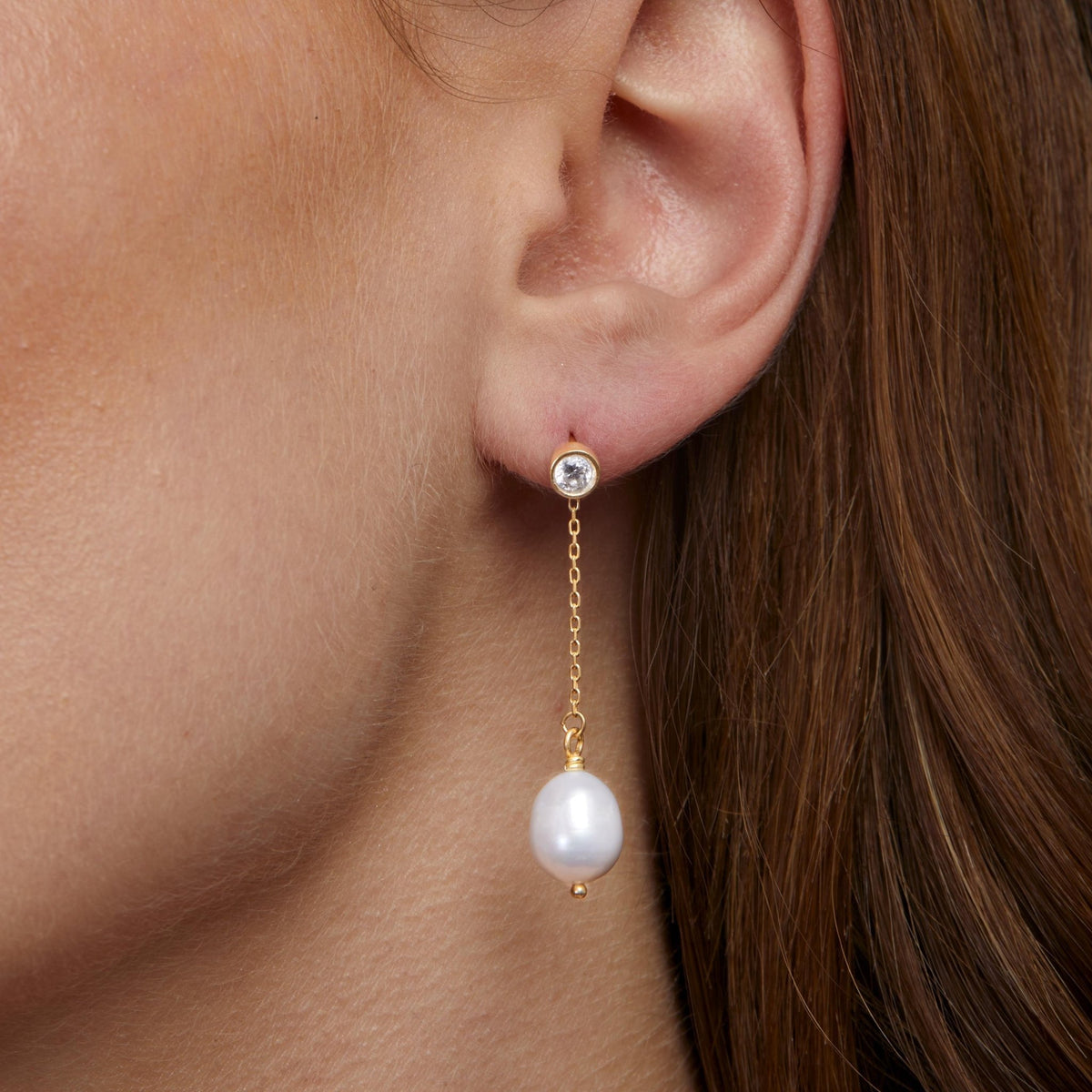 Close detail of the Gold Pearl Drop Wedding Earrings in 18K Gold Vermeil with Freshwater Pearl. Tarnish-resistant, premium.